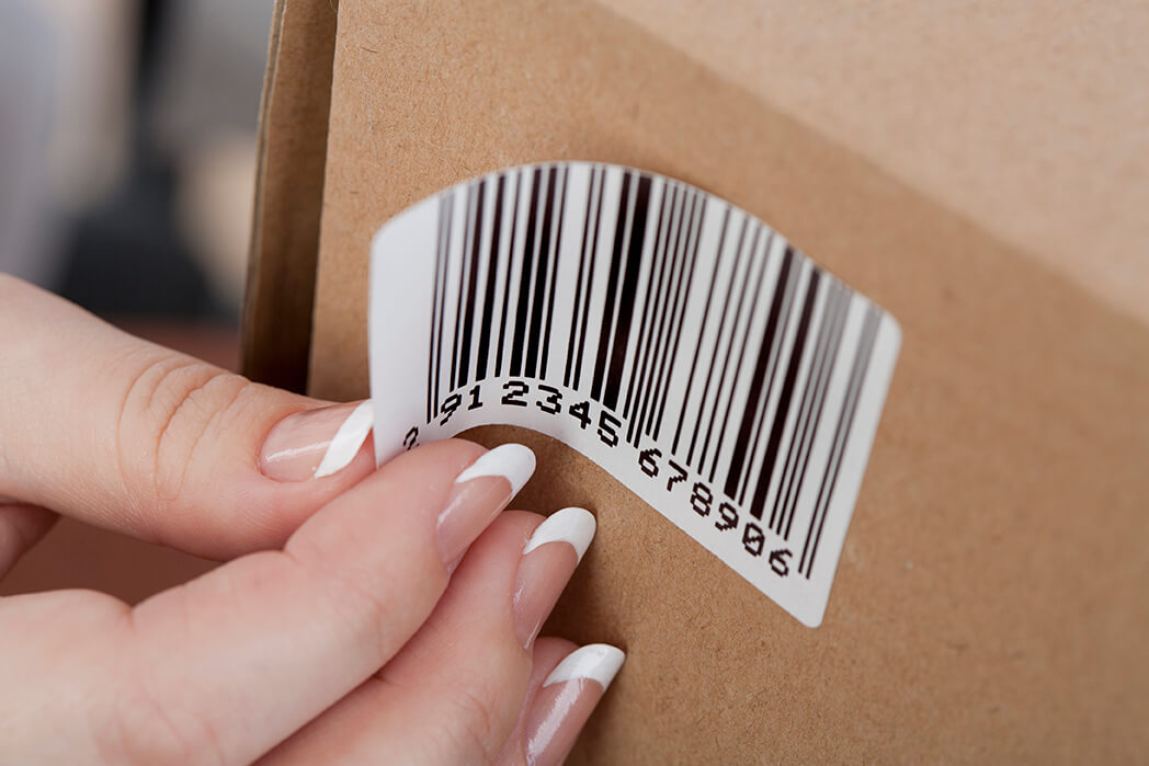 Sticky barcode label on the box. Close up